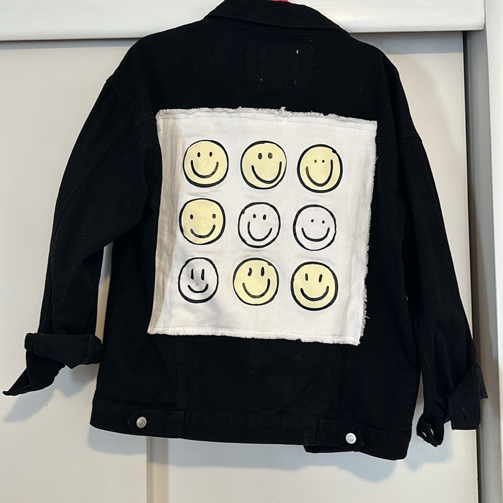 Black denim Med. oversized button up jacket with patch on back with happy faces